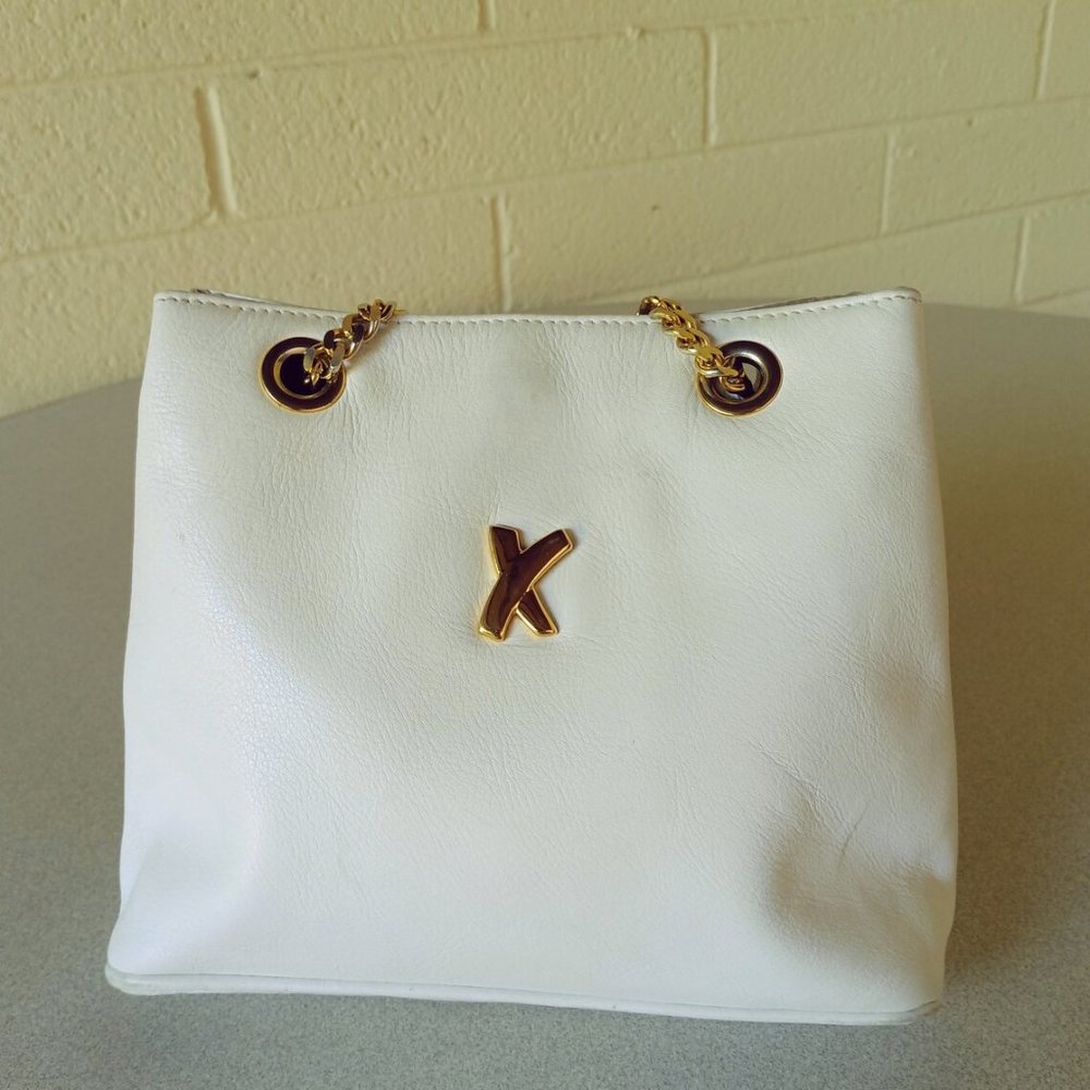 Vintage Paloma Picasso mini white leather handbag with goldtone chain strap